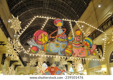 MOSCOW - DECEMBER 21: Drawn seals, snowflakes and Christmas illuminations in GUM building interior on December 21, 2014 in Moscow.