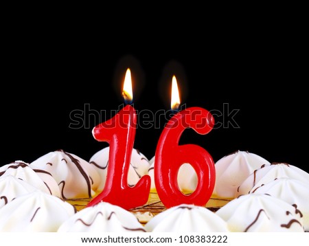Birthday-anniversary cake with red candles showing Nr. 16