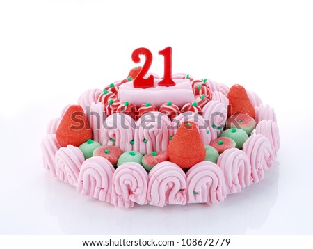 Birthday-anniversary cake with red candles showing Nr. 21