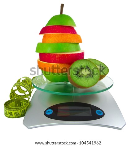 The mixed fruit on scales and a measurement tape