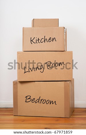 Set of package labeled Kitchen, Living Room and Bedroom. Ready for moving day.