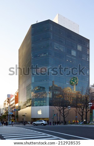Osaka, Japan - February 23, 2014: Shoppers and tourists past by a large Apple Store from tilt-shift lens on February 23, 2014 at Shinsaibashi, Osaka, Japan.