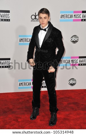 LOS ANGELES, CA - NOVEMBER 20, 2011: Justin Bieber arriving at the 2011 American Music Awards at the Nokia Theatre, L.A. Live in downtown Los Angeles. November 20, 2011  Los Angeles, CA
