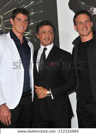 LOS ANGELES, CA - AUGUST 16, 2012: Sylvester Stallone & Olympic gold-medalists Conor Dwyer (left) & Ryan Lochte at the premiere of his movie \
