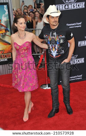 LOS ANGELES, CA - JULY 15, 2014: Brad Paisley & wife Kimberly Williams-Paisley at the world premiere of Disney\'s \