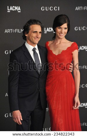 LOS ANGELES, CA - NOVEMBER 1, 2014: Producer Lawrence Bender & guest at the 2014 LACMA Art+Film Gala at the Los Angeles County Museum of Art.