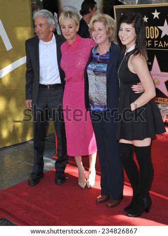 LOS ANGELES, CA - OCTOBER 29, 2014: Actress Kaley Cuoco with her parents & sister on Hollywood Boulevard where she was honored with the 2,532nd star on the Hollywood Walk of Fame.