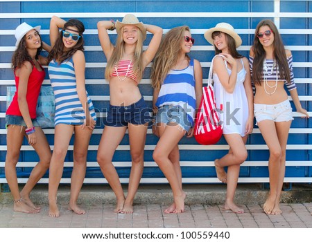 teens girls in beach wear at summer vacation or spring break