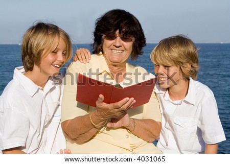 grandma reading to grandchildren