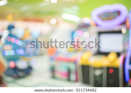 blur image of game arcade