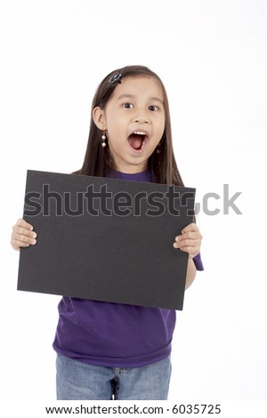 a girl holding a blank placard over a white background