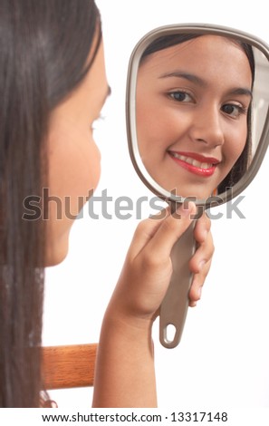 girl holding mirror on a white background