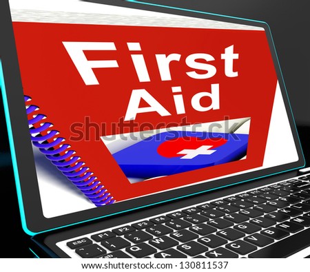 First Aid On Laptop Shows Medical Assistance Or Emergency Treatment
