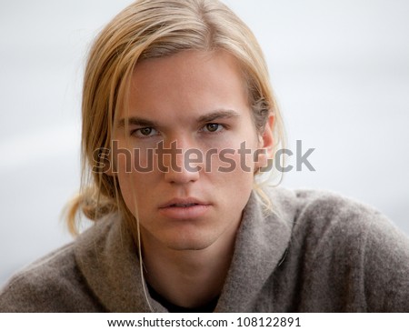 Attractive Young Man With Long Hair