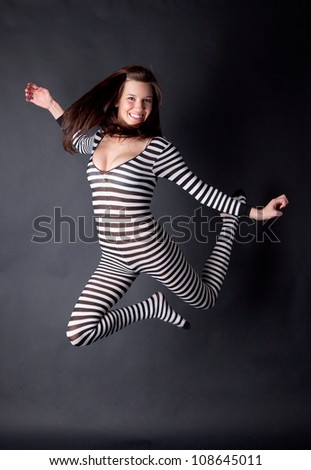 Happy Jumping Woman in Bodysuit