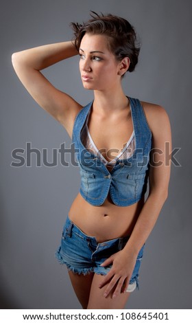 Sexy Woman In Jean Vest and Jean Shorts