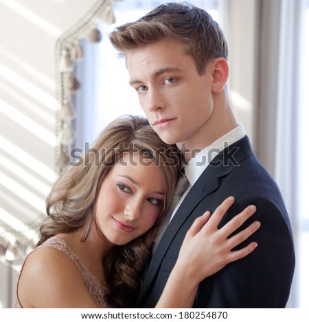 Cute Teenage Couple in Formal Outfits