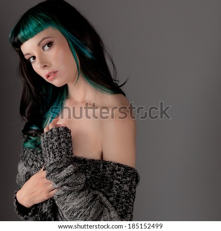 Coy Woman in Off Shoulder Sweater