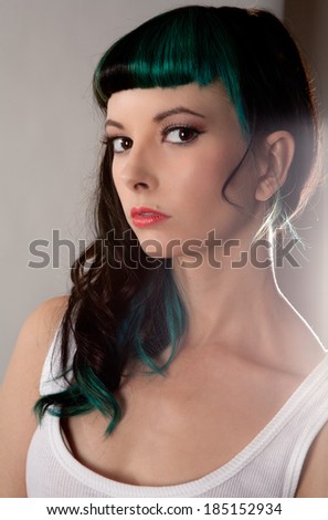 Portrait of Gorgeous Woman With Blue and Green Colored Hair