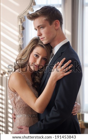 Dressed Up Young Couple Embracing