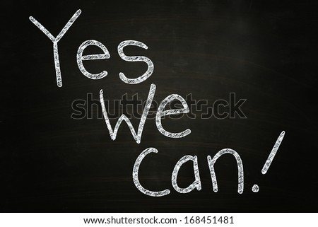 Yes We Can, Motivational Phrase written with Chalk on Blackboard