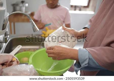 Similar – Image, Stock Photo Anonymous person preparing homemade lemon cake