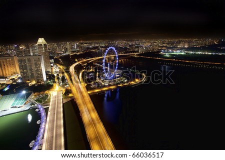Night scene of financial district, Singapore From the river