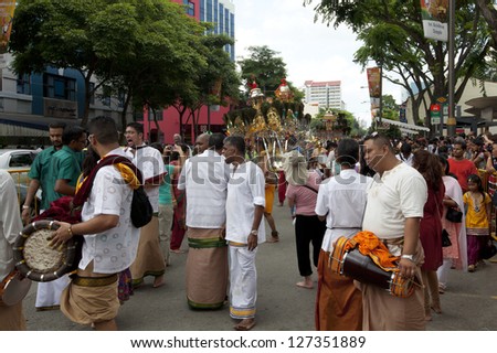 SERANGOON, SINGAPORE - JANUARY 27: Male Hindu devotee carries a kavadi at Thaipusam festival on January 27, 2013 in Singapore. Hindu festival to worship God Muruga.