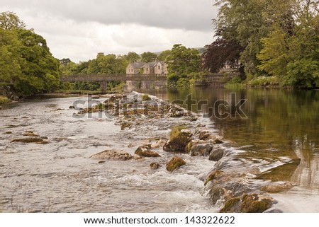 Looking down stream on the river Wharfe at Linton falls. Water flow is low due to a recent dry period.