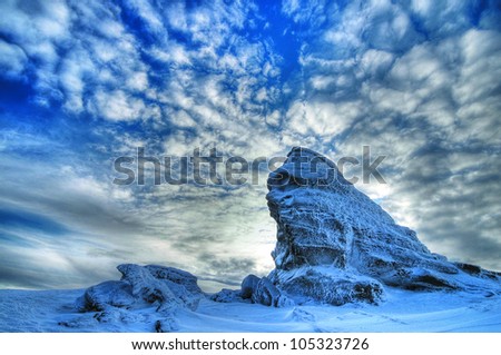 Great winter blue landscape with The Sphinx, a natural rock formation in the Mountains