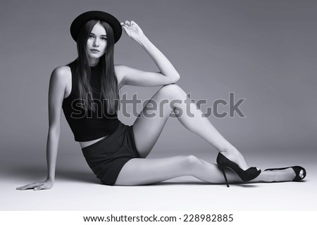 high fashion portrait of young elegant woman. Black and White image