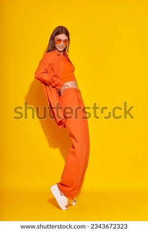 Similar – Image, Stock Photo Stylish woman in sunglasses leaning on building wall