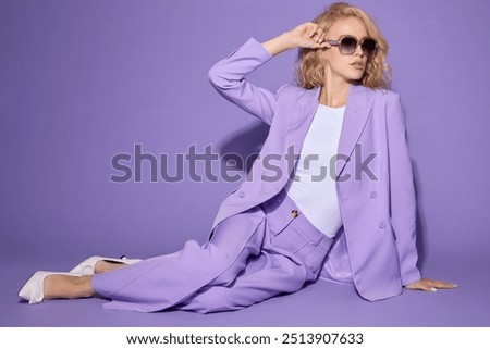 Similar – Image, Stock Photo Junge blonde Frau sitzt auf der Treppe im urbanen Raum