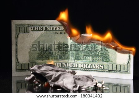 crisis, One hundred dollars in fire, burning dollar, ashes