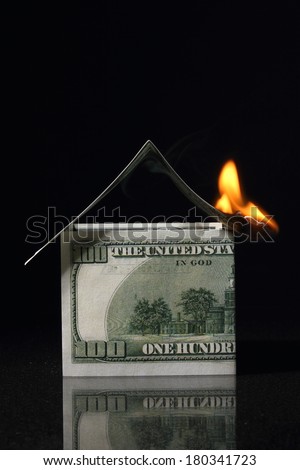 crisis, House made with One hundred dollars in fire, burning dollar