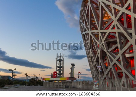 BEIJING, CHINA - OCT 10: The Beijing National Stadium, also known as the Bird\'s Nest on Oct 10, 2013 in Beijing. This Olympic venue is regarded as one of the Beijing\'s Top 10 tourist attractions.