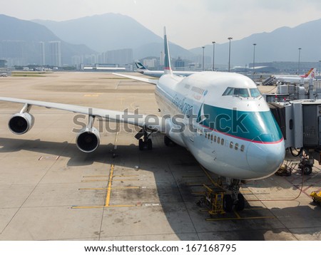 HONG KONG  - OCT 9: Cathay Pacific Boeing 747-400ready for boarding in Hong Kong Airport on Oct 9, 2013. Cathey Pacific was founded in 1946 and became one of the famous airline in Hong Kong