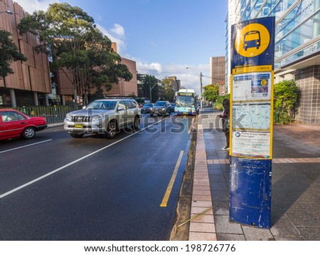SYDNEY, NSW, AUSTRALIA - May 30, 2014: Bus stop in Sydney next to University of New South Wales. Sydney\'s public transport system features a comprehensive network of train, bus and ferry services.