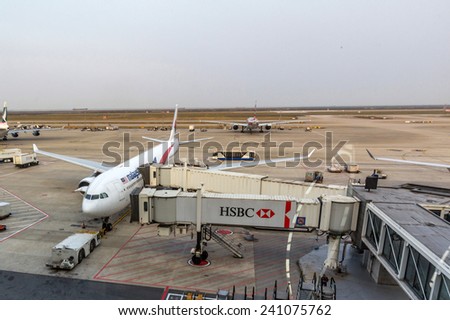SHANGHAI, CHINA - OCT 24, 2014: Malaysian Airlines planes are parked in Shanghai Pudong International Airport. The airport is a major international hub for Air China.