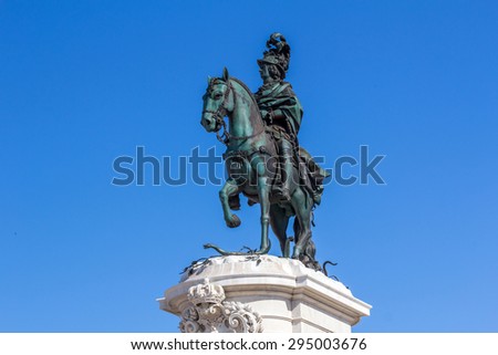 LISBON, PORTUGAL - MAY 26, 2015: Statue of King Jose I. The King on his horse is symbolically crushing snakes on his path. It s located in Commerce Square, the city of Lisbon, Portugal.
