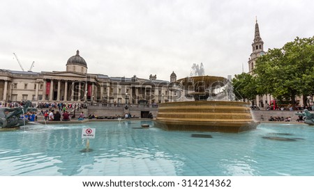 LONDON, UK - JULY 21, 2015: Trafalgar Square is a public space and tourist attraction in London, built around the area formerly known as Charing Cross. It is situated in the City of Westminster.