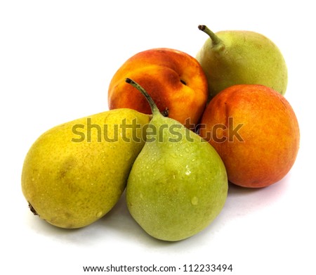 Two juicy nectarines and three pears isolated on a white background