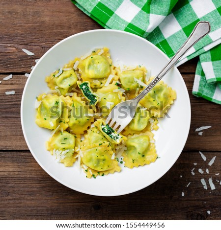 Image, Stock Photo Spinach ravioli with butter and sage