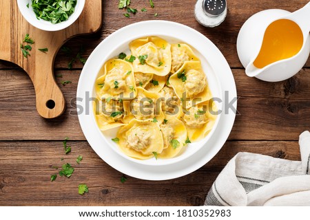 Similar – Image, Stock Photo Spinach ravioli with butter and sage