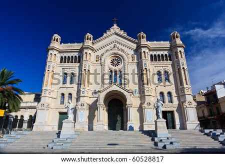 Wide-angle shot of frontal view of Duomo Cathedral in neo-romanesque style of Reggio Calabria in the Southern Italy