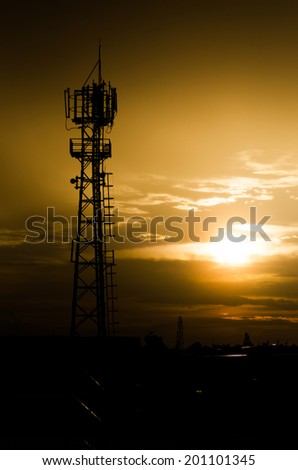Phone antenna at evening sky , Phone antenna at sunset