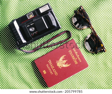Passport in Thailand for Travel , Equipment for Tourism  , Passport Camera Glasses , Still life Travel
