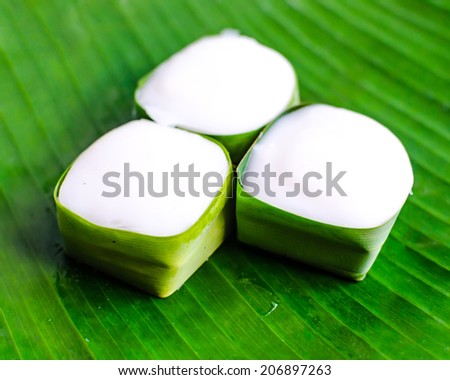 Pudding with coconut topping , Thailand dessert with banana leaf