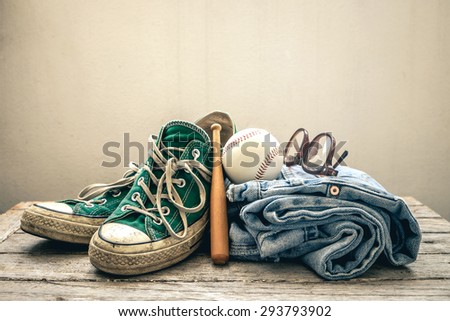 Concept Still life hipster man , Green Sneaker with jeans and glasses on wooden background , Lifestyle hipster