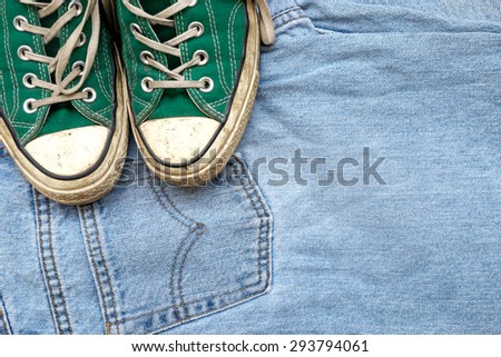 Green sneaker on jeans , Lifestyle hipster